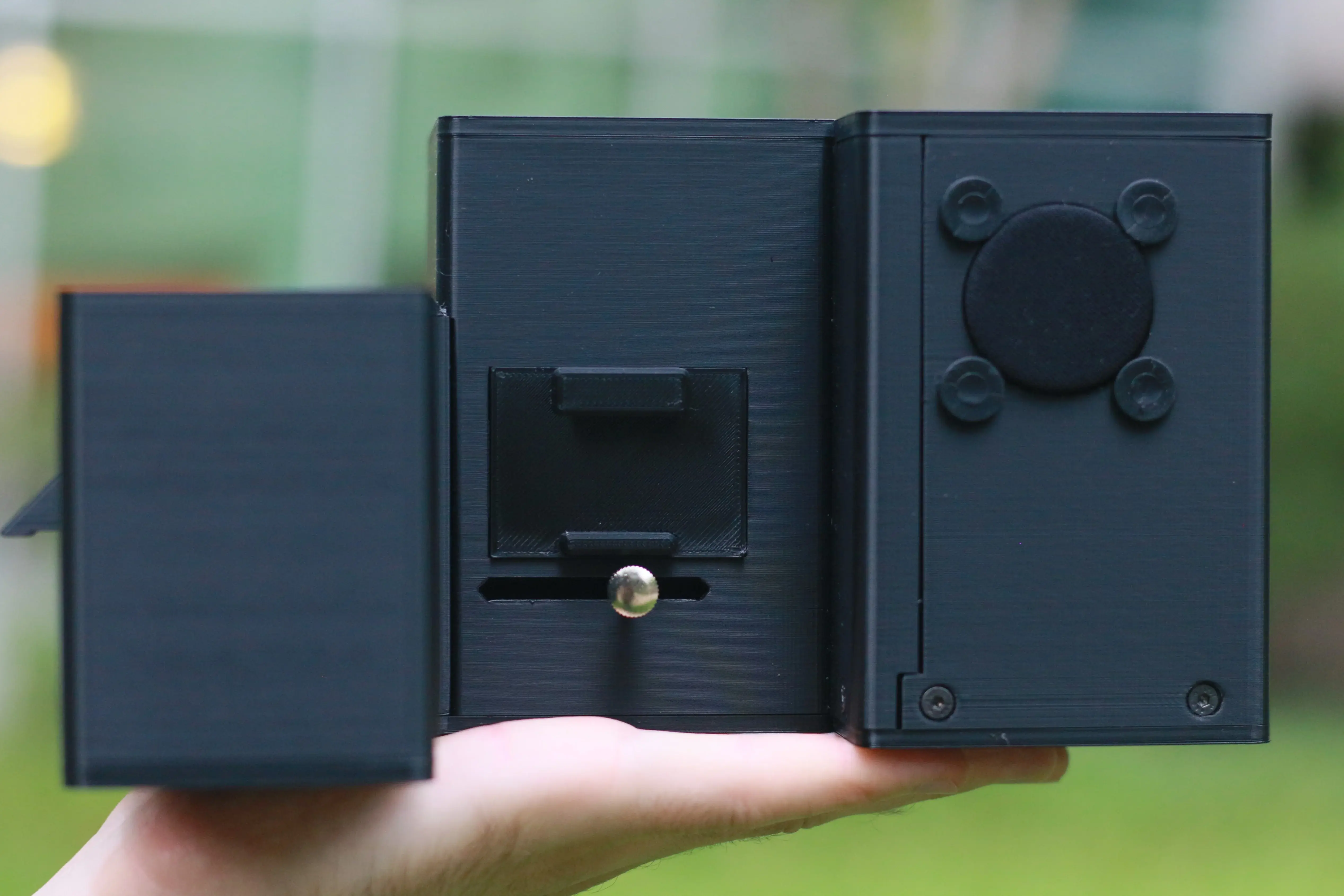 ARTiMiS flow imaging microscope held in hand